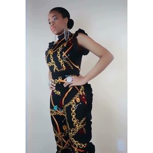 Multi striped jumpsuit with ruffle detail